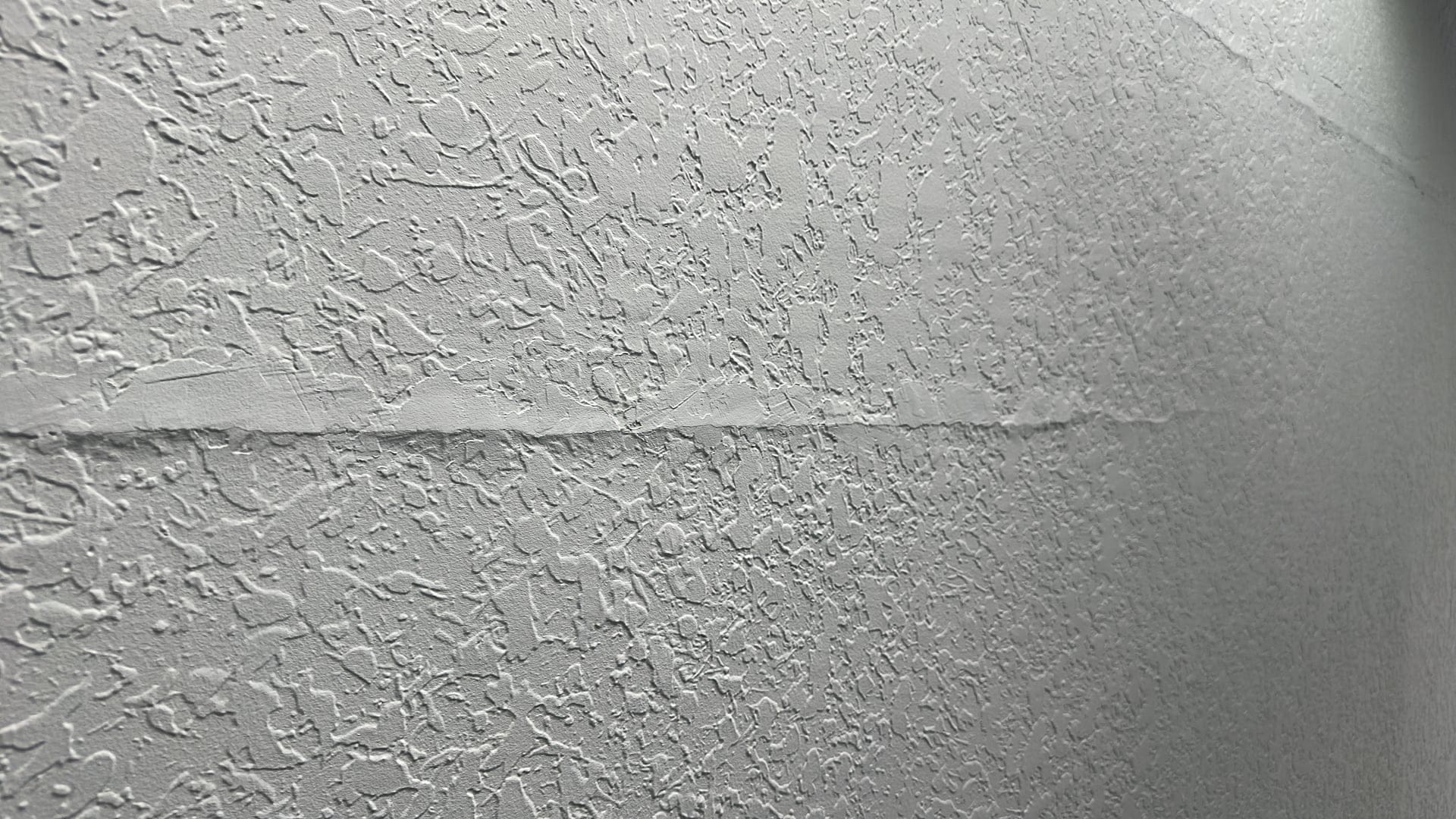 Ceiling crack inspection during warranty inspection